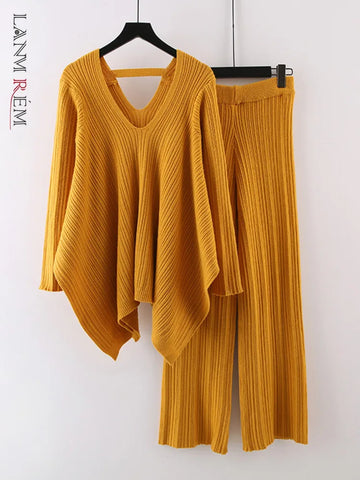 Image of Irregular Knitted 2 Piece Set Women's V-neck Backless Long Sleeves Solid Sweater High Waist Wide Leg Trousers-FrenzyAfricanFashion.com