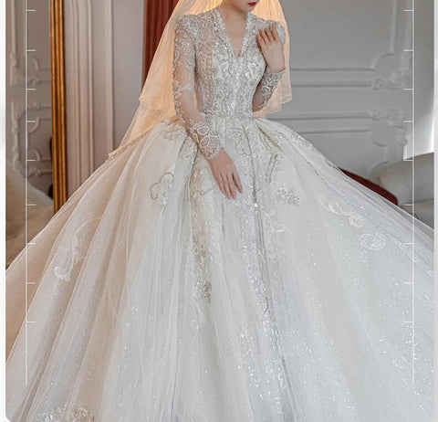 Image of Luxury White Wedding Dresses Long Sleeves V-Neck Lace Beaded Pearls Backless Sweep Train Appliques Lace Wedding Bridal Gown 2022-FrenzyAfricanFashion.com